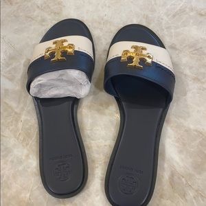 Brand new never worn Navy Tory Burch sandals